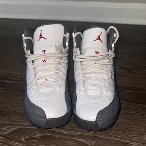 White and Gray Sneakers with Red Accents